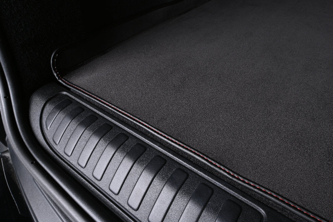 black alcantara material cargo trunk mat