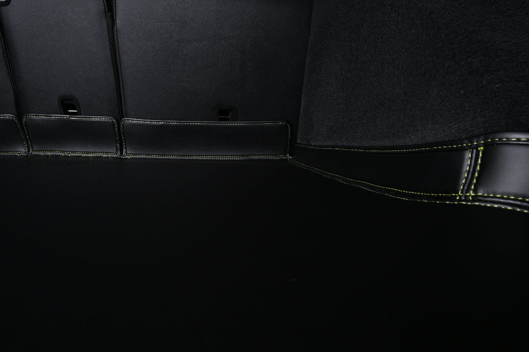 black leather with green stitching cargo mat