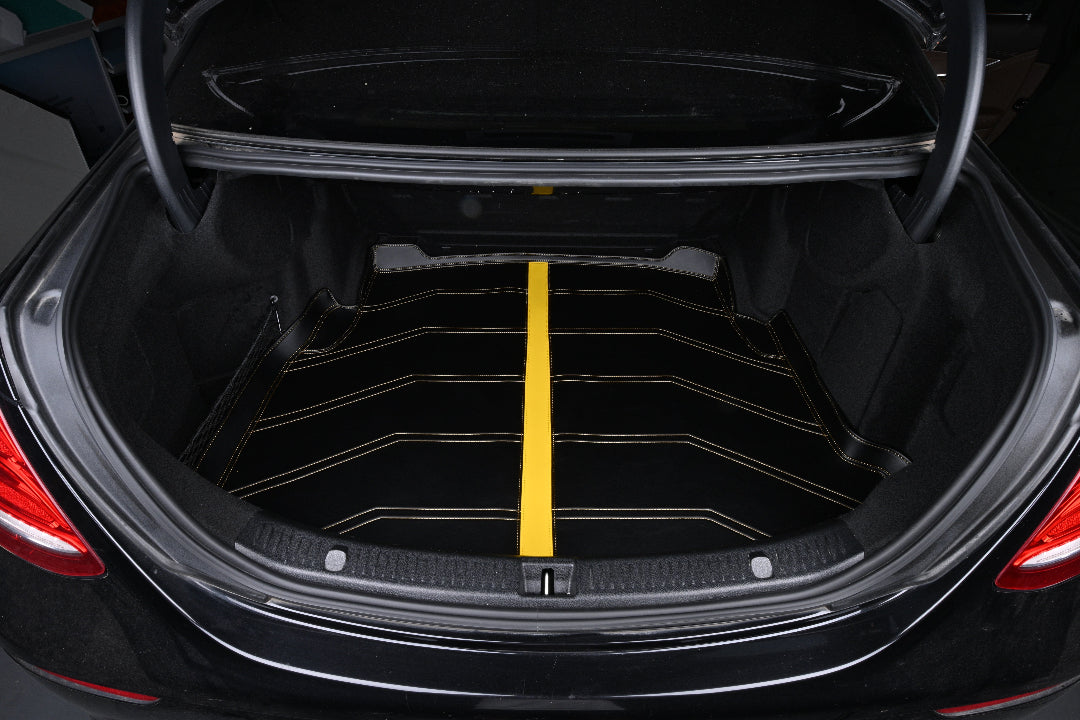 black leather with yellow stitching car mat  