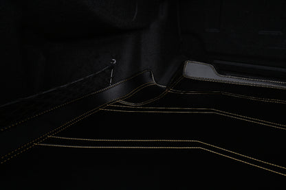 black leather with yellow stitching cargo mat