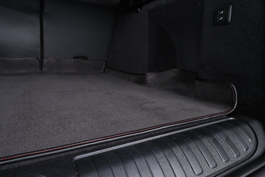 black velvet suede with red stitching cargo car mat