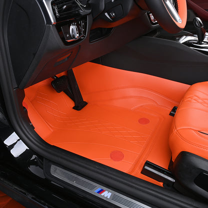 bmw car floor mat with orange leather in diamond stitching