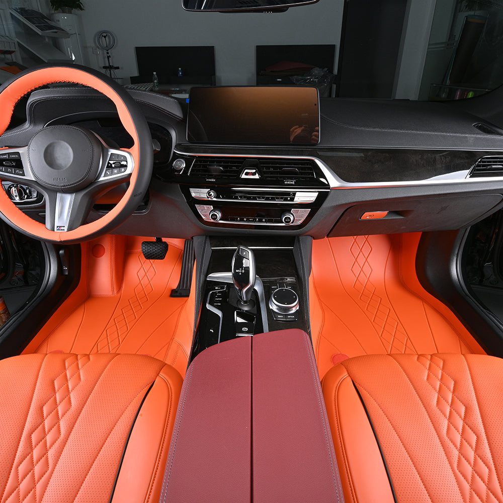 custom floor mat of car with orange leather 