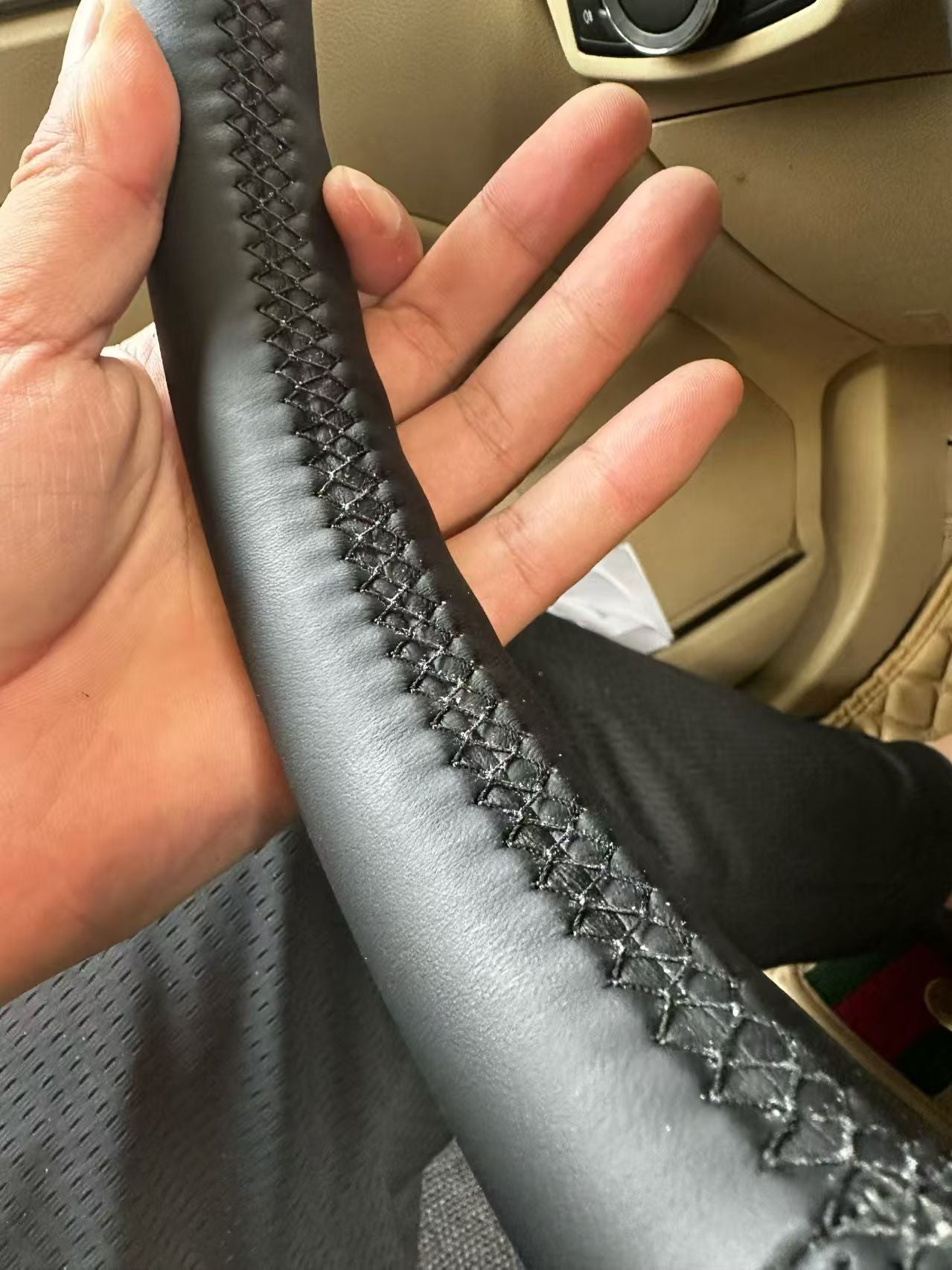 hand-stitching_leather_steering_wheel_cover_for_ford