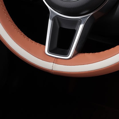 orange and white leather hand-stitched steering wheel cover for porsche